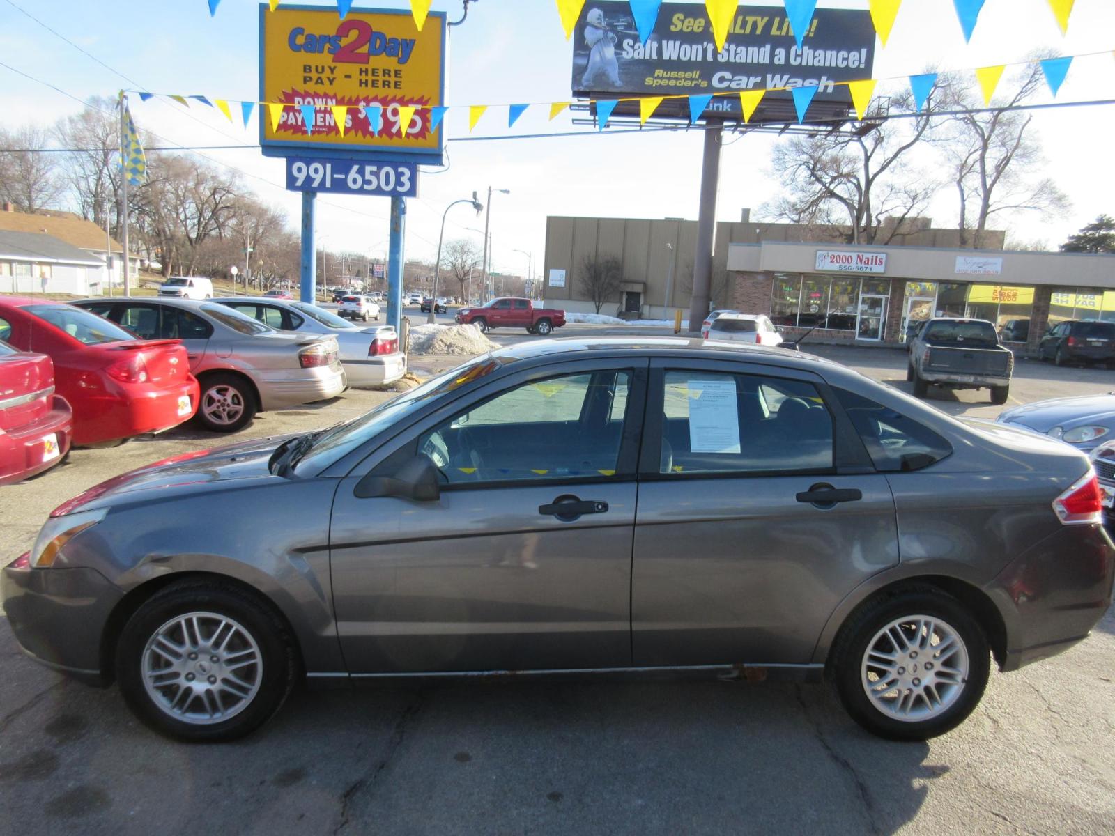 2010 Ford Focus SE Sedan (1FAHP3FN5AW) with an 2.0L L4 DOHC 16V engine, located at 1020 NW Radial Hwy, Omaha, NE, 68132, (402) 991-6503, 41.269718, -95.983231 - Photo #0