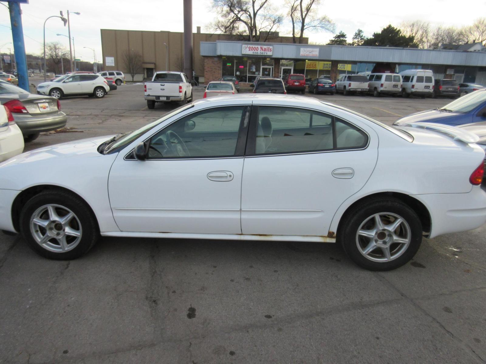 2004 Oldsmobile Alero GL1 Sedan (1G3NL52E14C) with an 3.4L V6 OHV 12V engine, 4-Speed Automatic Overdrive transmission, located at 1020 NW Radial Hwy, Omaha, NE, 68132, (402) 991-6503, 41.269718, -95.983231 - Photo #0