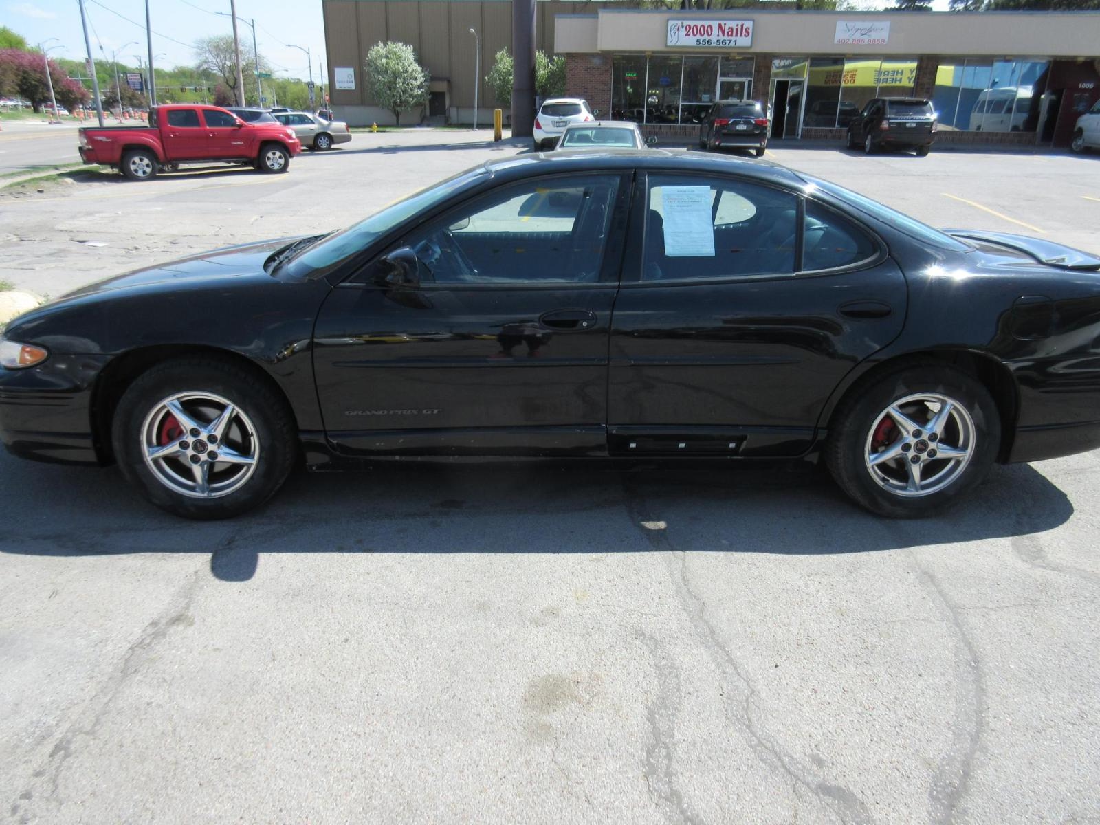2003 Pontiac Grand Prix GT (1G2WP52KX3F) with an 3.8L V6 OHV 12V engine, 4-Speed Automatic Overdrive transmission, located at 1020 NW Radial Hwy, Omaha, NE, 68132, (402) 991-6503, 41.269718, -95.983231 - Photo #0