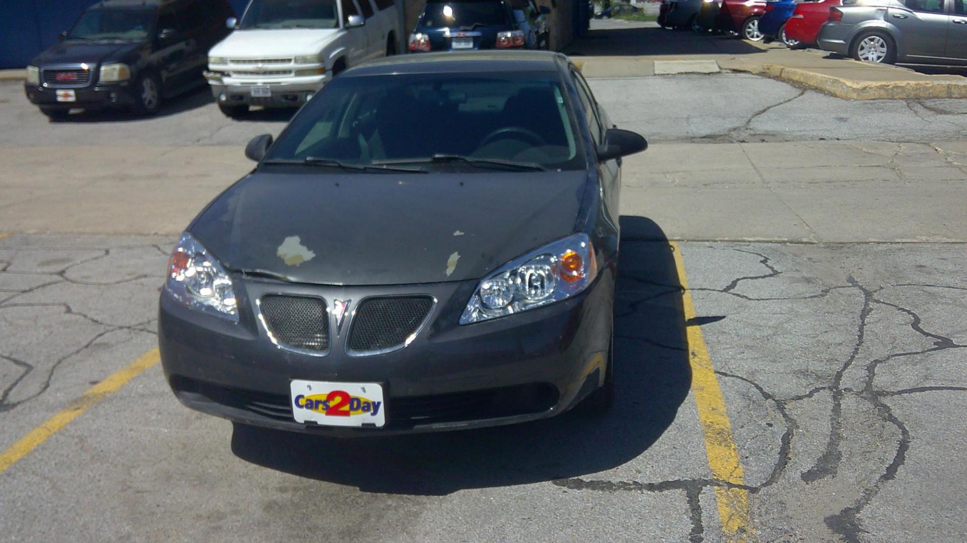 2006 Pontiac G6 1SV Sedan (1G2ZF55B564) with an 2.4L L4 OHV 8V engine, 4-Speed Automatic Overdrive transmission, located at 1020 NW Radial Hwy, Omaha, NE, 68132, (402) 991-6503, 41.269718, -95.983231 - Photo#1