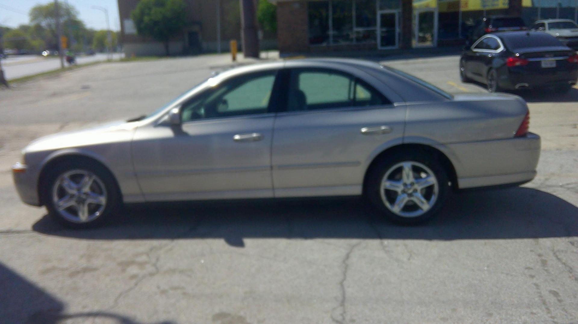 2002 Lincoln LS V8 Base (1LNHM87A52Y) with an 3.9L V8 DOHC 32V engine, 5-Speed Automatic Overdrive transmission, located at 1020 NW Radial Hwy, Omaha, NE, 68132, (402) 991-6503, 41.269718, -95.983231 - Photo#2